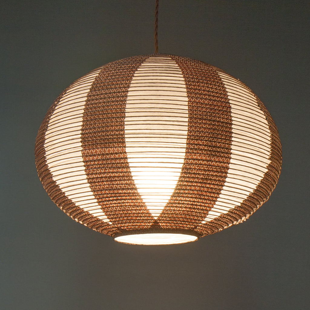 Brown double-layered Japanese paper lamp shade - up lit