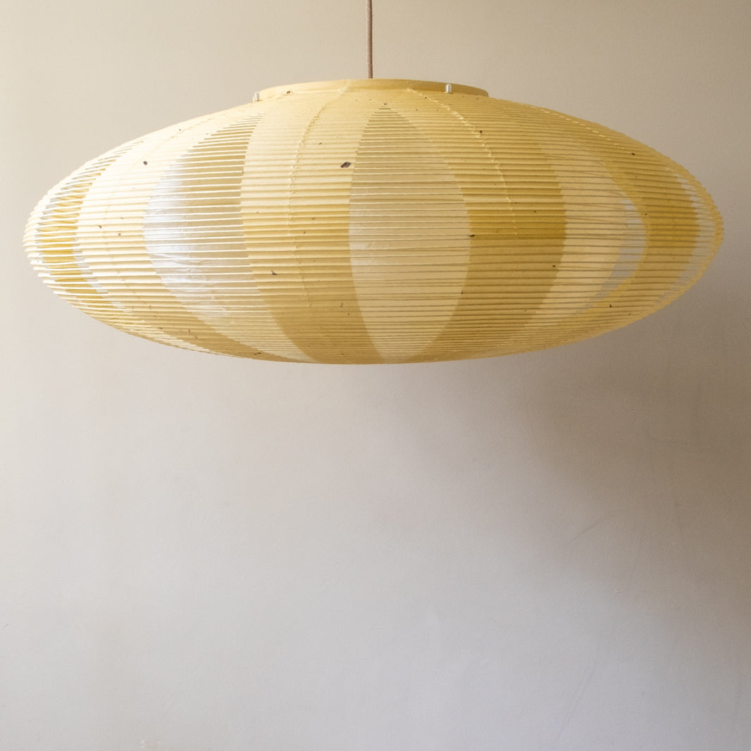 Sophisticated double-layered 75cm Oval shade, handmade from Japanese washi paper, unlit with plain background