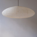 90cm diameter, large oval paper lampshade, handmade in Japan from Hemp (Asaraku) paper, which has large random holes in it - straight view