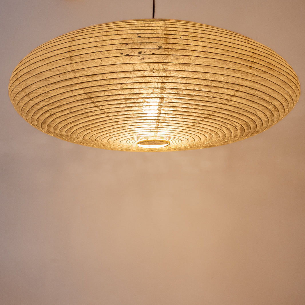 90cm diameter, large oval paper lampshade, handmade in Japan from Hemp (Asaraku) paper, which has large random holes in it, illuminated