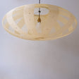 A 90cm diameter elliptical, kozo Japanese paper lampshade in the skashi style (constructed in strips), unilluminated.
