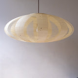 A 90cm diameter oval, kozo washi Japanese paper lampshade in the skashi style (constructed in strips), side view, unilluminated.