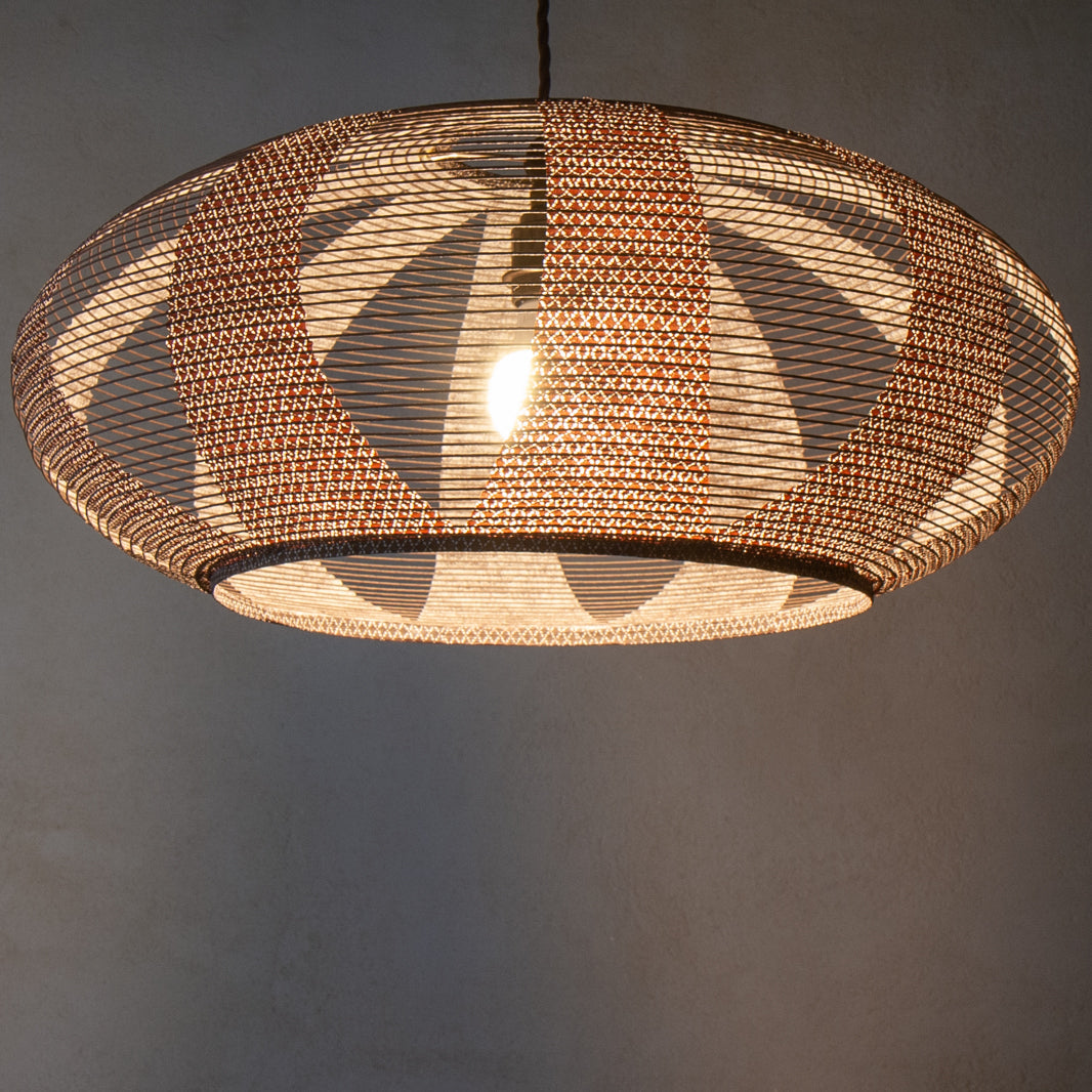 53cm Oval or Enban Shape Pendant Japanese Paper Lampshade, in a brown handprinted paper and constructed in the skashi style, illuminated