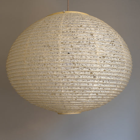 A large 71cm maru (round) paper lampshade, handmade from Japanese hemp washi paper in the asaraku style, where small holes are left in the paper