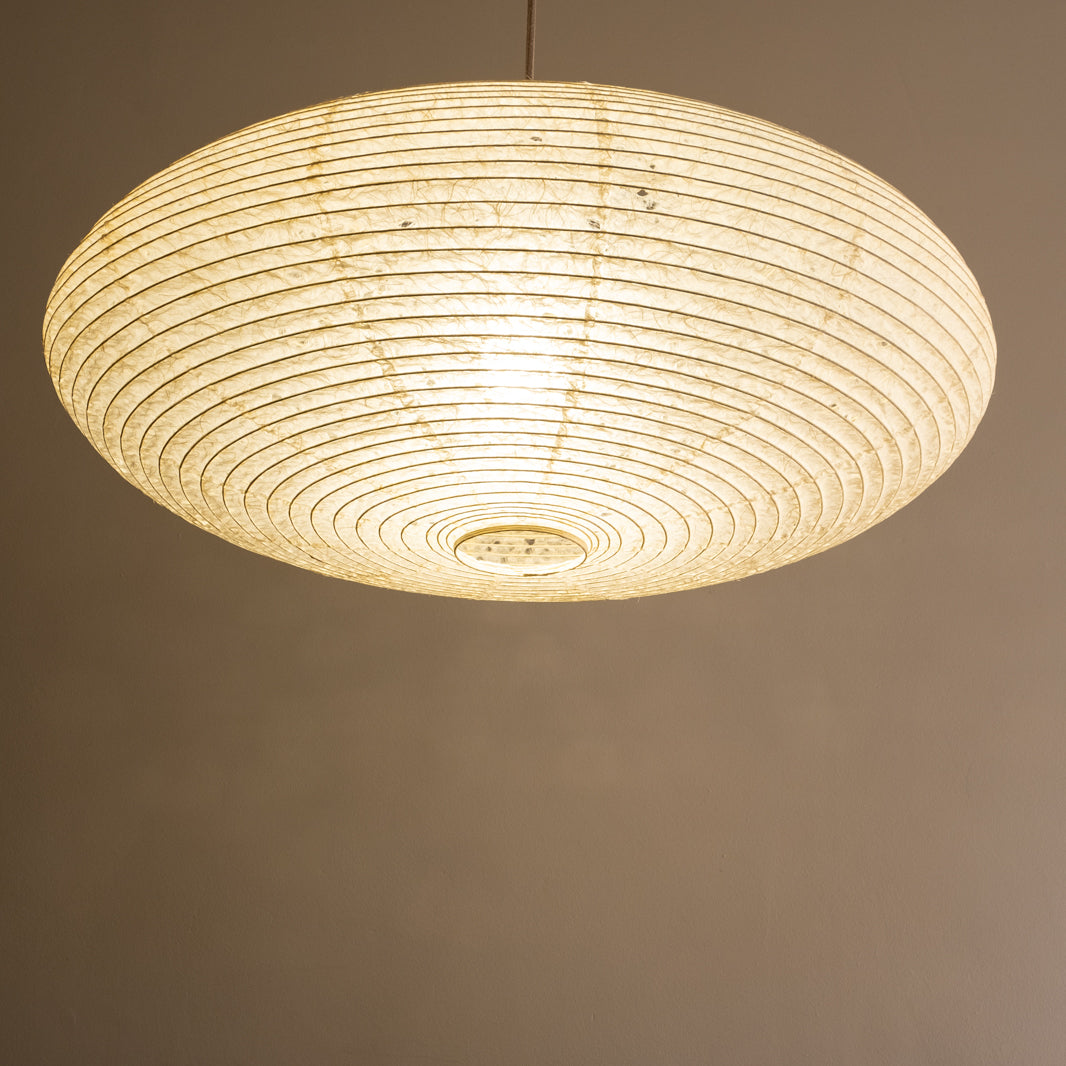 75cm diameter oval shade, hemp (asaraku) paper with small holes in, under view, illuminated