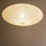 75cm diameter oval shade, hemp (asaraku) paper with small holes in, under view, illuminated