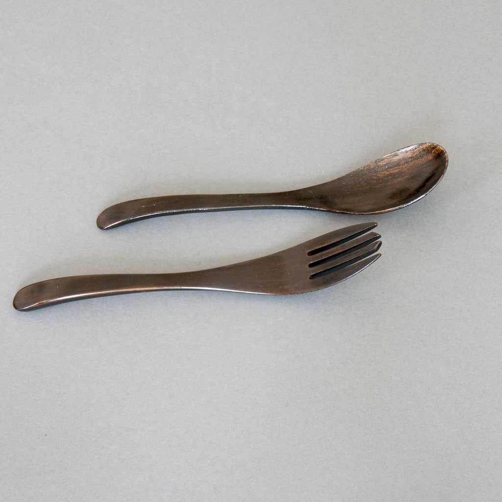 Dark lacquered fork and spoon handmade in Japan