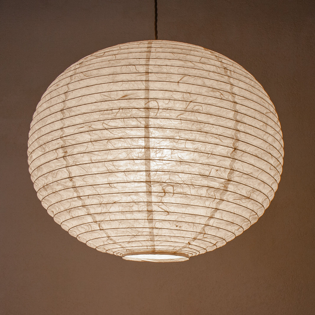 Lovely soft, warm light from this Handmade Japanese paper shade, in traditional Unryu paper (Lit)