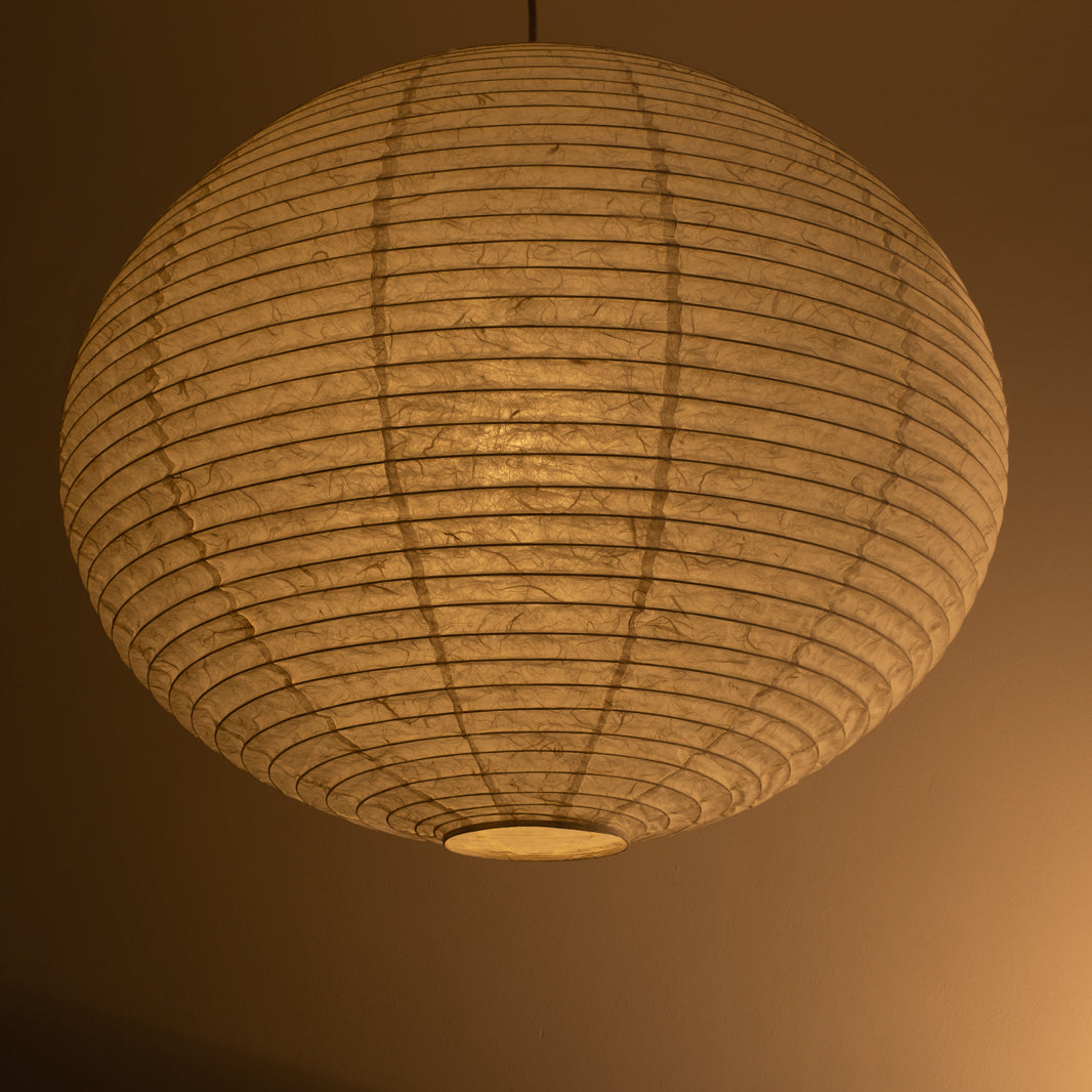 71cm diameter, large Japanese paper lampshade in white "Unryu" paper, three quarter view, lit