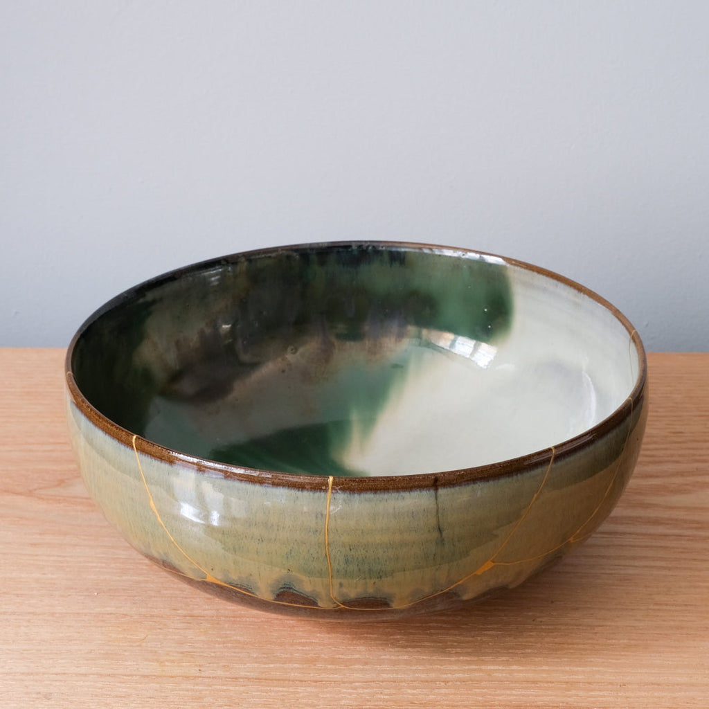 Beautiful traditional kintsugi on traditional Japanese Stoneware bowl