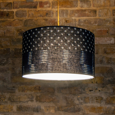 Japanese indigo patterned lampshade on brick wall