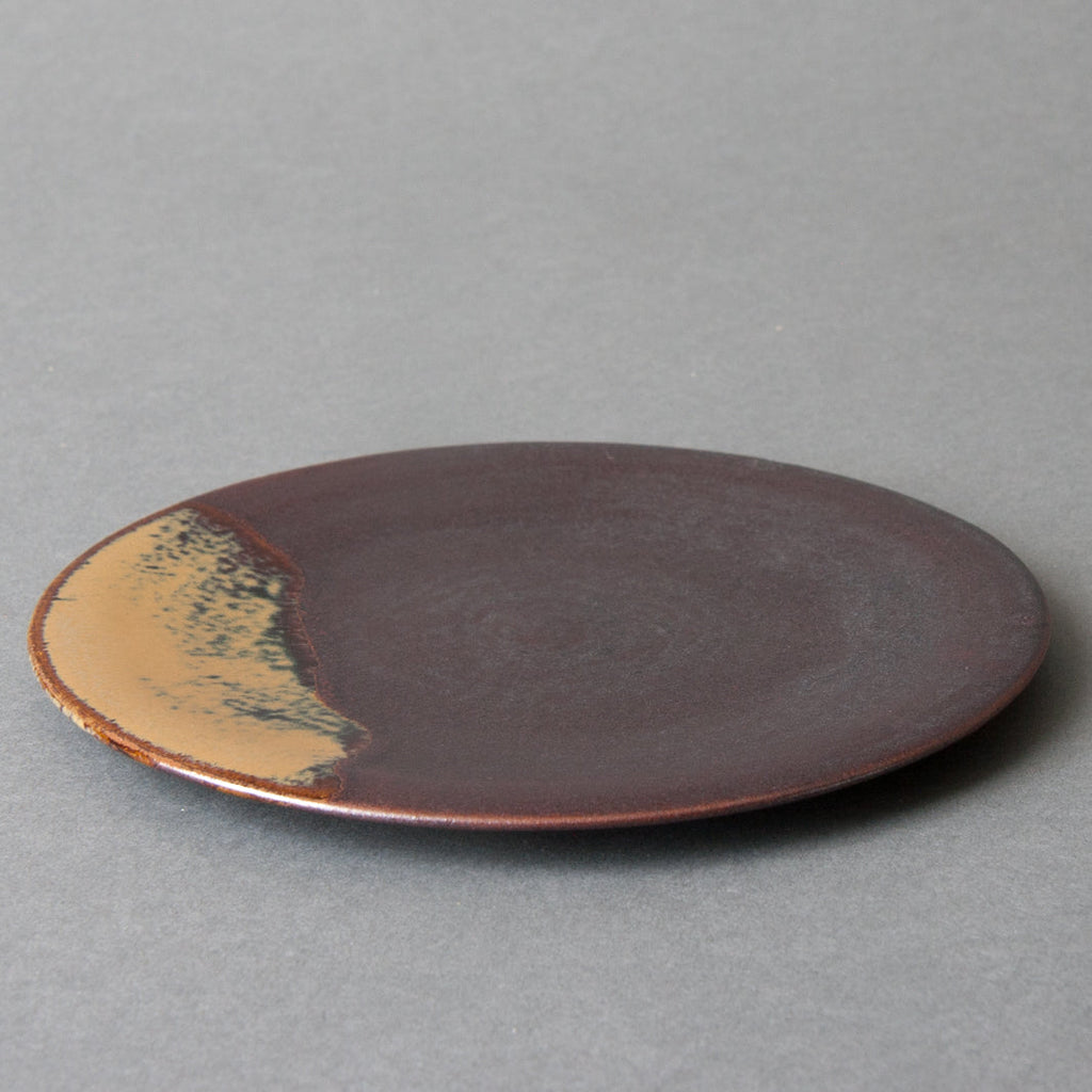 Finely made, flat plates, brown with yellow glaze, handmade in Japan